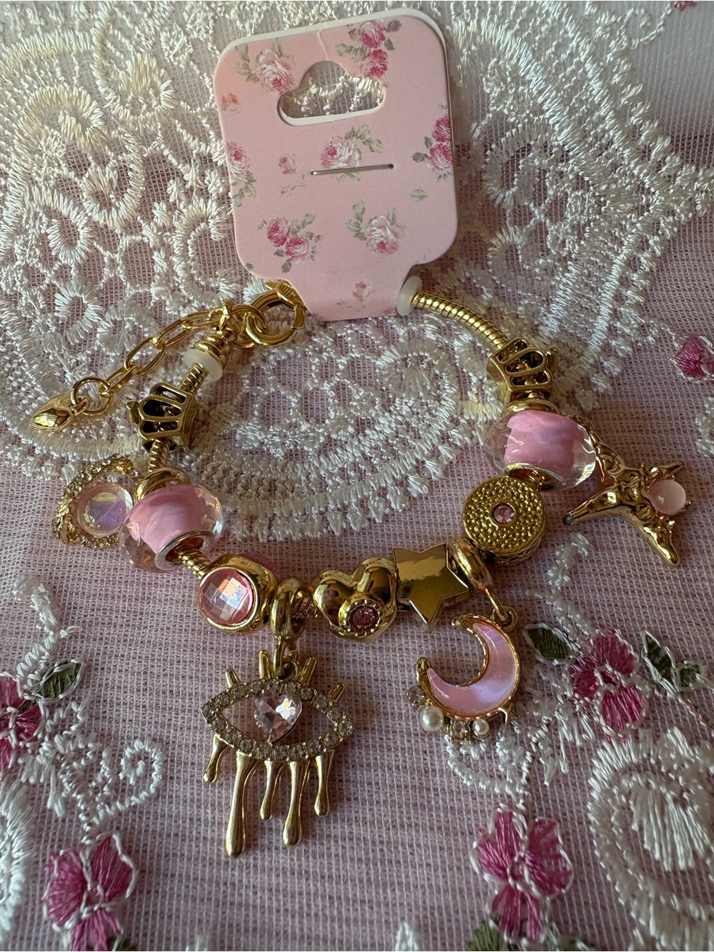 Gold-Tone Pink Charm Bracelet with Crescent, Star & Eye Charms
